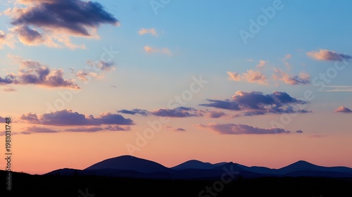 Serene Twilight Sky Mountain Silhouette Soft Pastel Clouds Wide Angle Panoramic Peaceful Dusk Nature Scenery HD Design
