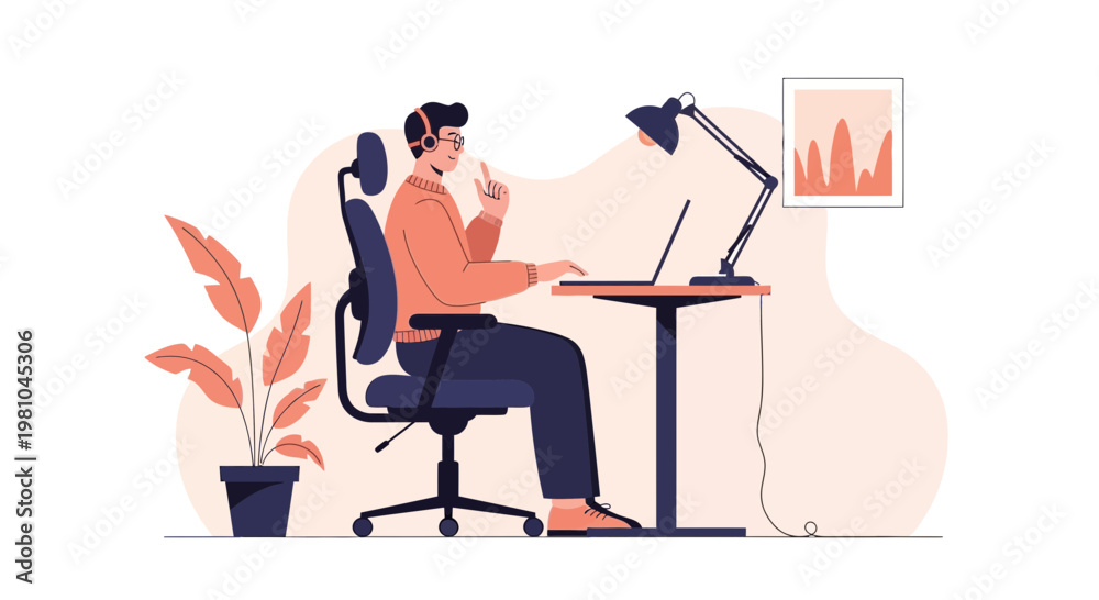 Fototapeta premium Man working on laptop at desk with headphones, modern office setup, remote work