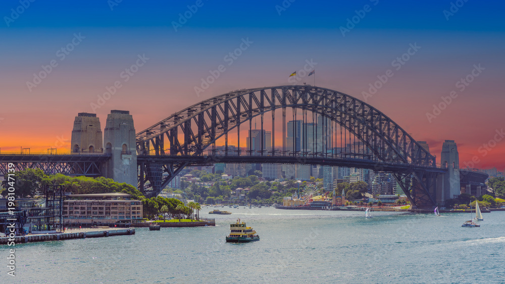 Obraz premium Panoramic view of Sydney Harbour and Circular Quay on a Beautiful Autumn Afternoon lovely colours of the sky in Sydney NSW Australia