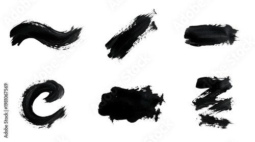 Black ink brush strokes set with various shapes including curves diagonal lines and textured smears on transparent background png set