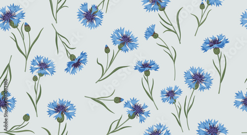 Blue cornflowers and green stems create a beautiful seamless pattern on a light gray background suitable for home decor.