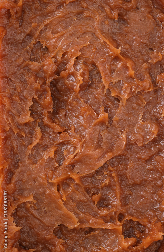 Obraz premium salt caramel paste texture, caramel spreadable cream close up, caramel spread