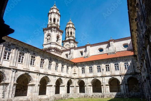 Sobrado dos Monxes, A Coruña, Spain; April 12, 2026: Renaissance Medallions Cloister and Baroque church towers, 16th-17th century, Sobrado dos Monxes Monastery
