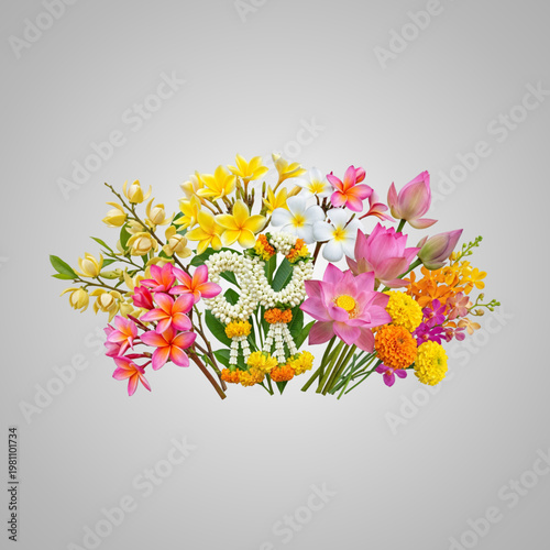 Colorful Bouquet of Exotic Tropical Flowers and Thai Phuang Malai Garland Against Plain Studio Background