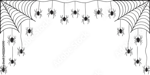 Hanging spiders on a web border for Halloween decoration during autumn