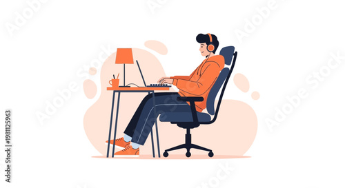 Young man working on laptop with headphones, modern home office setup