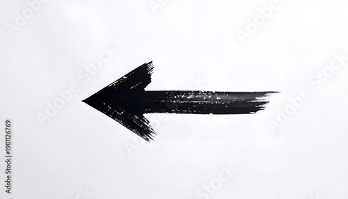 A stark black arrow, rendered with a brushstroke effect, boldly points to the left against a clean white background, creating a minimalist and impactful visual.