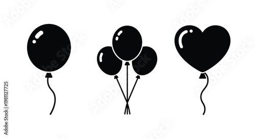 Black balloons in various shapes create a celebratory design silhouette