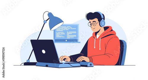 Young programmer coding on laptop, wearing headphones, focused on screen, desk setup