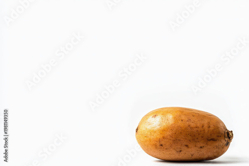 Ripe brown tamarind isolated on white background, showcasing its smooth texture and natural color, evokes sense of freshness and simplicity