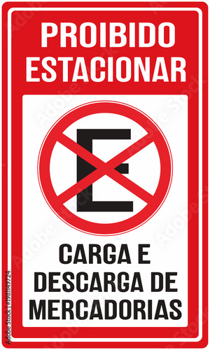 sign in red color that says in portuguese language of Brazil : no parking. area for loading and unloading goods