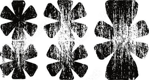 grungy asterisk shapes with distressed texture in black and white, abstract design elements