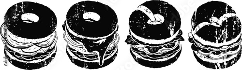 Four delicious burgers with lettuce and cheese on dark background fresh fast food meal presentation