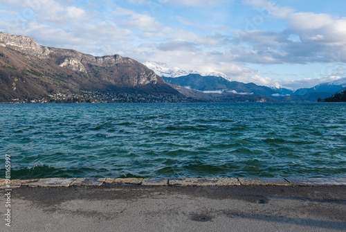 landscape of Lac d´Annecy in France with mountains in background and waterfront in front