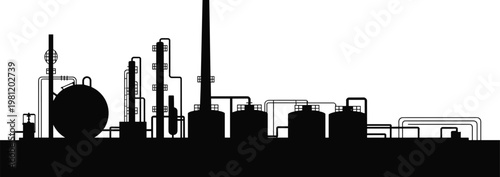 Silhouetted industrial oil refinery with storage tanks and smokestacks at dusk industrial facility