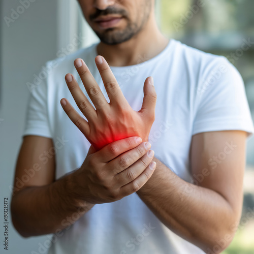 Close-up photograph of a person with hand pain.