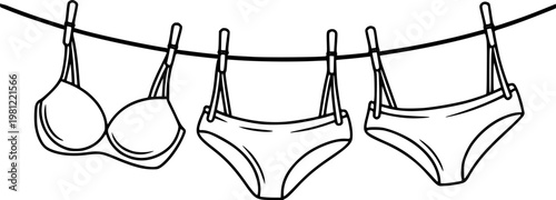 Line of bra and panties hanging clothesline with clothespins lingerie underwear