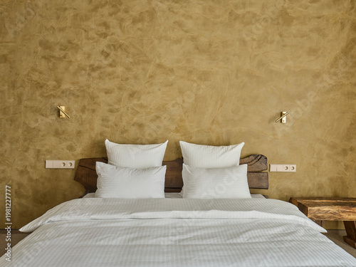 Modern and Cozy Hotel Bedroom Interior with Warm Lighting	