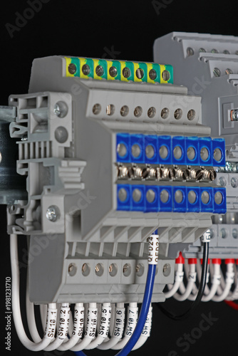 Electrical screw terminals for connecting copper electrical wires with metal lugs in electrical switchboard. 