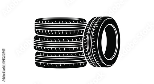 Stacked tires and a single tire a bold black silhouette