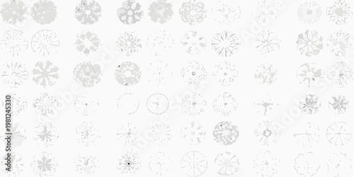 Numerous grayscale circular patterns densely arranged on a white background