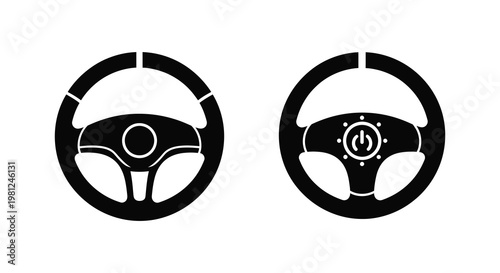 Two black steering wheels depicted as a stark silhouette