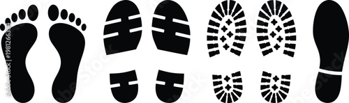 Various footprints and shoe prints in black on white background