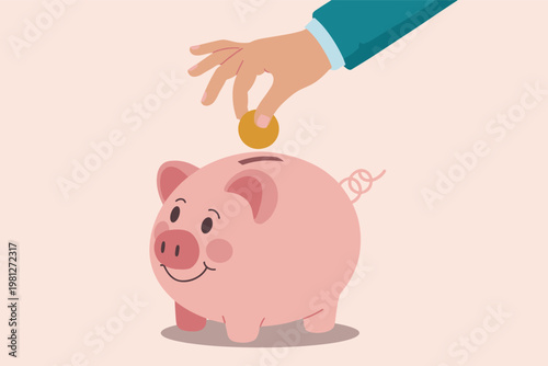 Hand dropping coin into pink piggy bank saving money