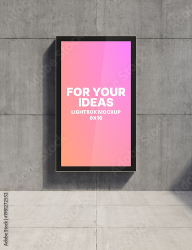 A 9x16 vertical lightbox hangs on a concrete wall for presenting your ideas. Presentation space. Advertising space. 3D rendering
