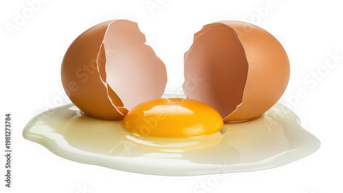 Cracked egg with yolk and white on a surface, close-up