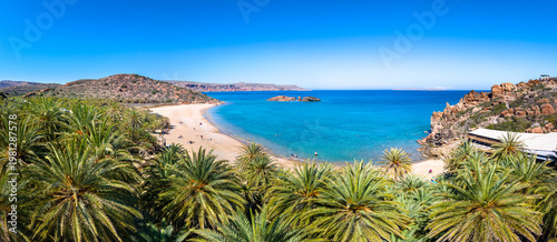 Scenic landscape of palm trees, turquoise water and tropical beach, Vai, Crete, Greece.