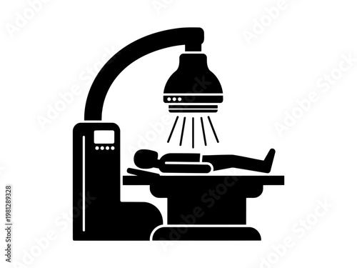 A perfect and smooth black silhouette of a person lying on an xray table silhouette with a machine above
