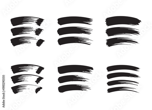 Set of thick black artistic brush strokes with tapered ends and rough dry bristle textures vectors