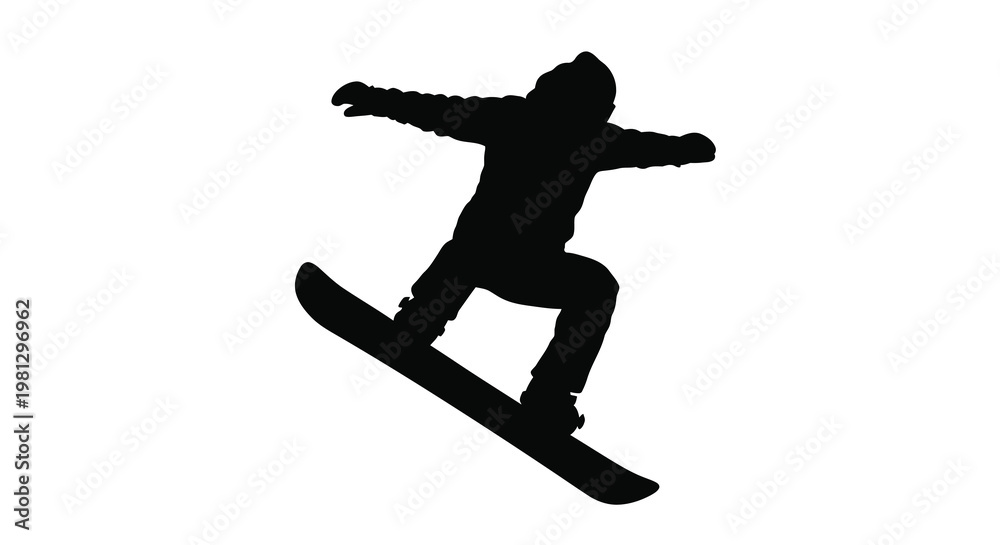 Fototapeta premium Silhouette of a snowboarder performing a trick in mid air