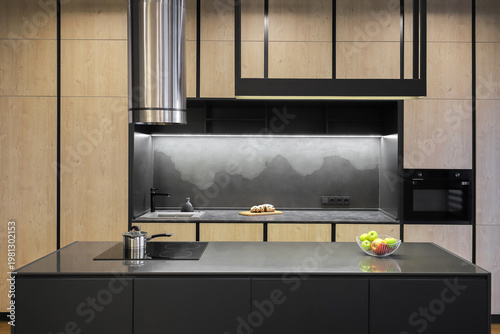 Island table in the kitchen in the interior