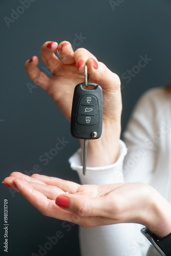 Car Key Handover Concept Remote Key Above Open Palm Close-Up