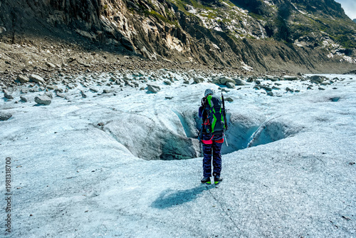 Принти на полотні Solo hiker exploring glacier crevasse on Mont Blanc route in the Alps