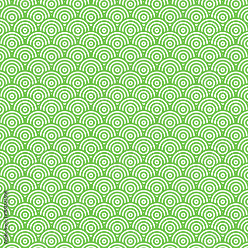 Seamless green and white geometric pattern with a Japanese Seigaiha wave motif, creating a calming and repetitive texture.