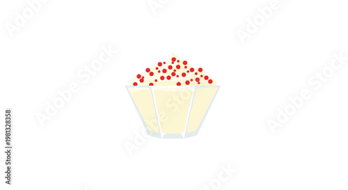 A faceted glass bowl contains a generous serving of smooth vanilla cream topped with a scattering of tiny red berry pieces against a white backdrop.