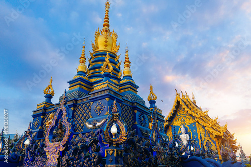 Vászonkép Wat Rong Suea Ten, Blue temple complex at sunset glow Chiang Rai, Thailand