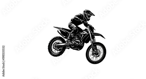Motocross Rider Performing a Jump on a Dirt Bike.