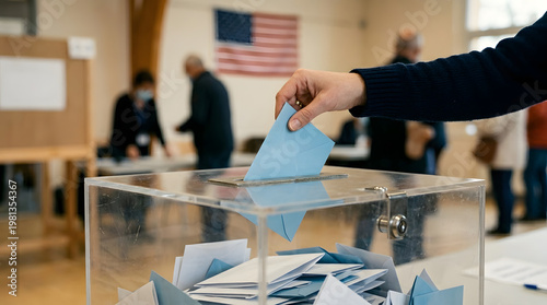 Voting Moment: A hand casting a ballot into a clear ballot box, symbolizing the core act of democracy. The setting captures a vital moment within the political process.