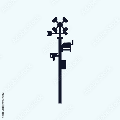 A weather station with a wind vane and anemometer on top of a pole with a rain gauge and other meteorological instruments attached to it.