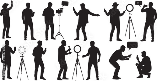 Silhouettes of men working with photography equipment and lighting