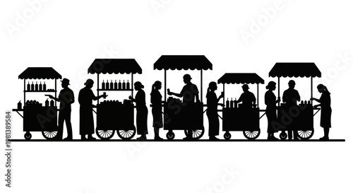 Silhouette of people buying food from street vendors.