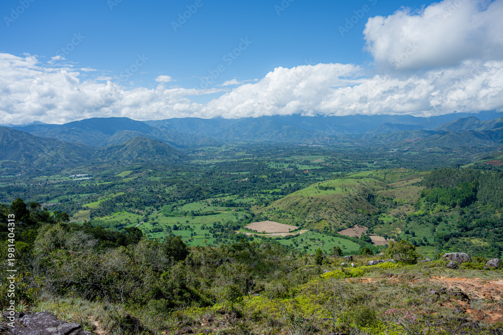 Fototapeta premium Mogotes valley landscape from santander mountains showing clouds