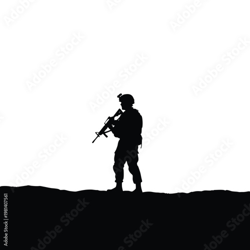 Silhouette of a soldier holding a rifle against a clear sky