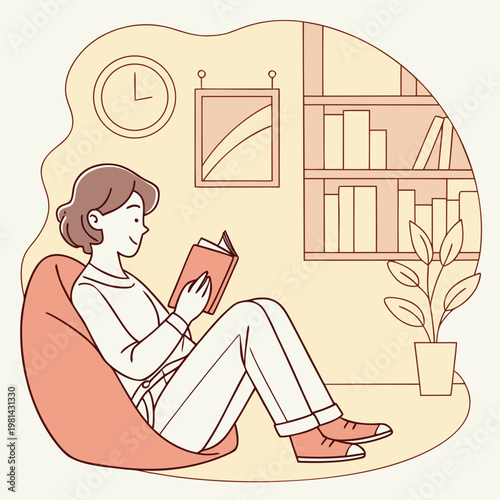Woman sitting in a bean bag chair reading a book