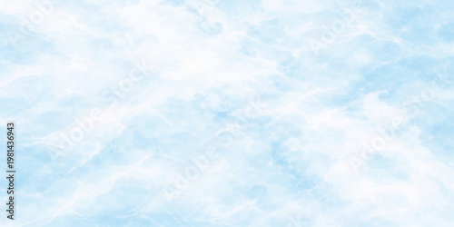 Fluffy white clouds float through a beautiful bright blue sky on a clear sunny day, creating a natural atmosphere with a light abstract cloudscape and a soft summer air