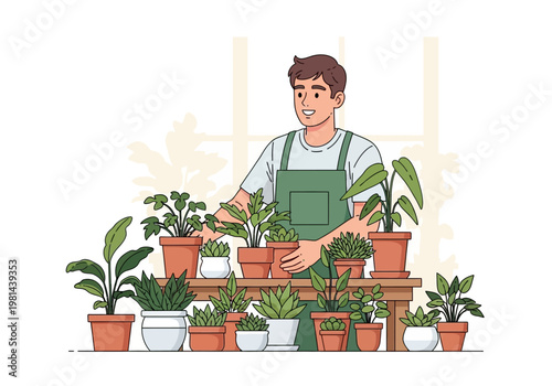 Man holding potted plant in greenhouse.